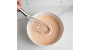 Cookout Sauce Recipe 19 Cookout sauce being whisked until smooth and creamy texture