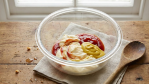 Cookout Sauce Recipe: The Creamy Southern Dip Americans Can’t Stop Loving 15 Mayonnaise, ketchup, and yellow mustard added to a glass mixing bowl