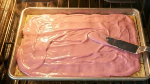 Valentine’s Day Crack Candy – The Sweet & Salty Treat Everyone Is Obsessed With 21 Spreading melted chocolate on crack candy
