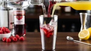 Raspberry Lemon Drop Cocktail Recipe – Bright, Boozy & Ready in Minutes 16 Vodka, raspberry liqueur, and fresh lemon juice added to a cocktail shaker