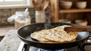 Soft flour tortillas heating on pan for baked beans burrito