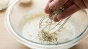 Mazzio’s Ranch Recipe 17 Adding ranch seasoning to the mixture