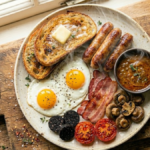 Full English breakfast with curry gravy sausages bacon eggs beans and toast